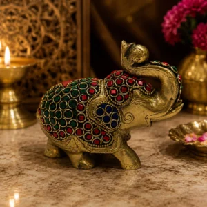 stone studded brass elephant decor