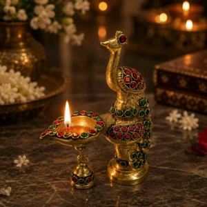 brass peacock diya