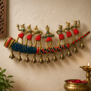 brass tribal dancer wall hanging